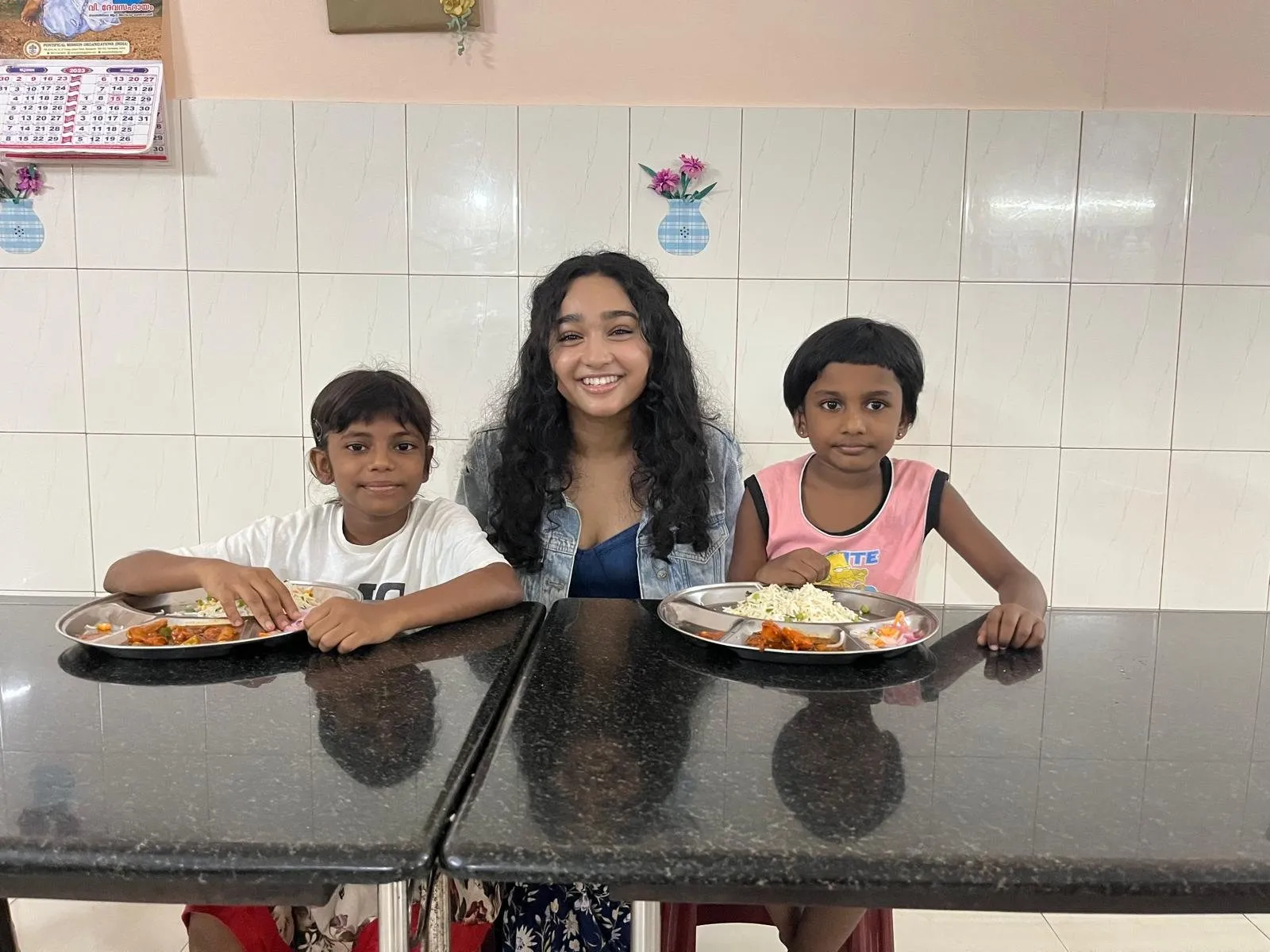 Serving a meal at an orphanage in Kerala